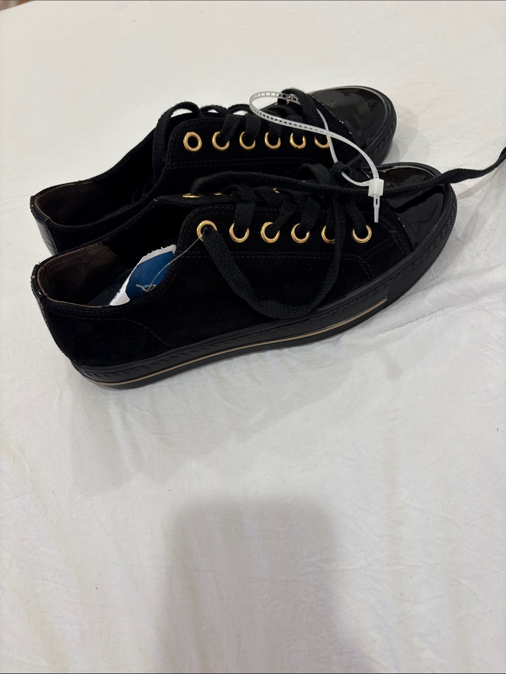 Paul Green Black Low-Top Sneakers with Gold Eyelets